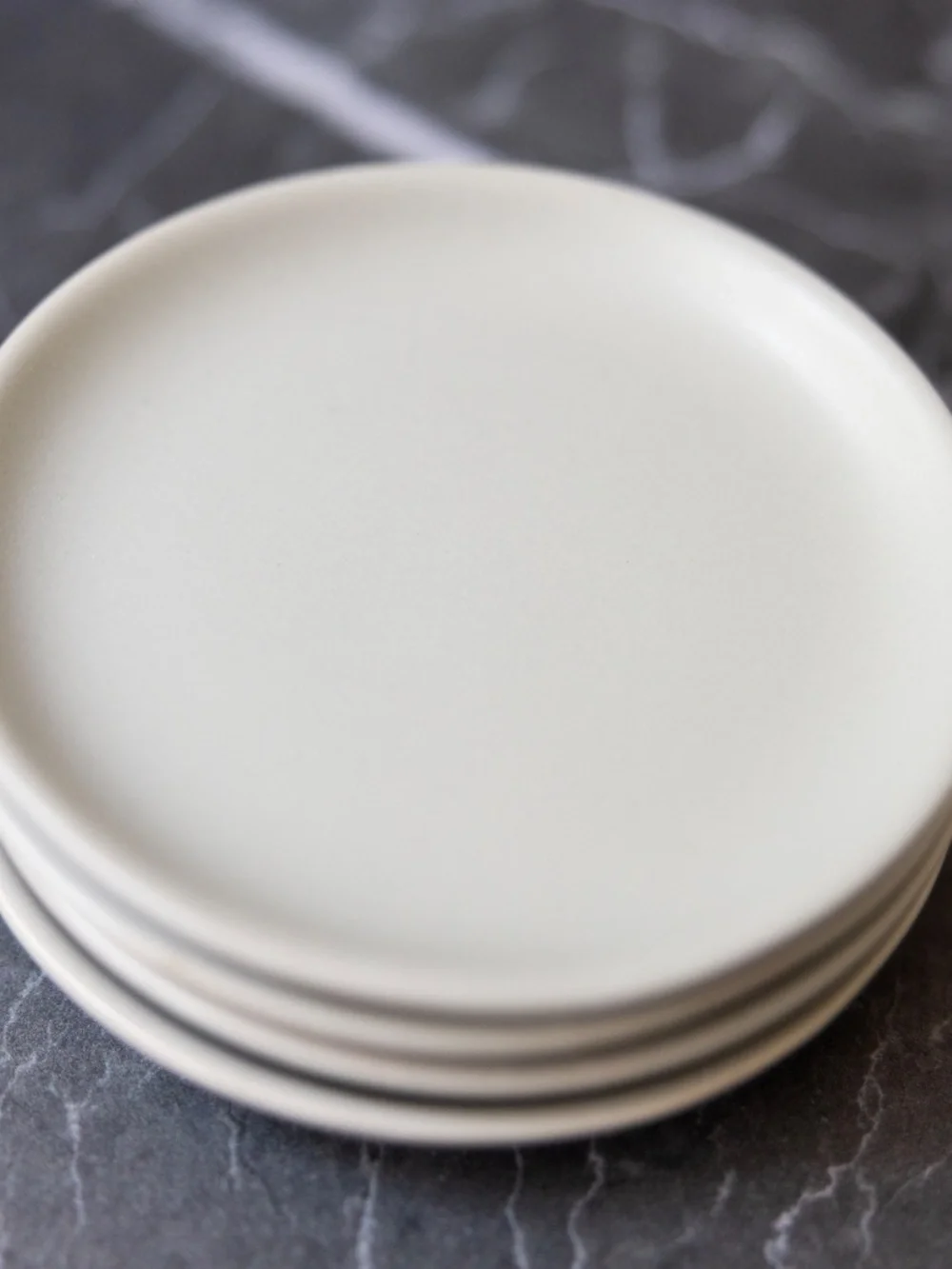 Set of 4 gray small ceramic plates Crate and Barrel made in Thailand 4.5 inches